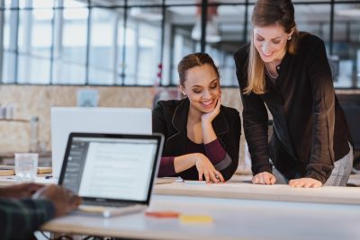 two women working on a project